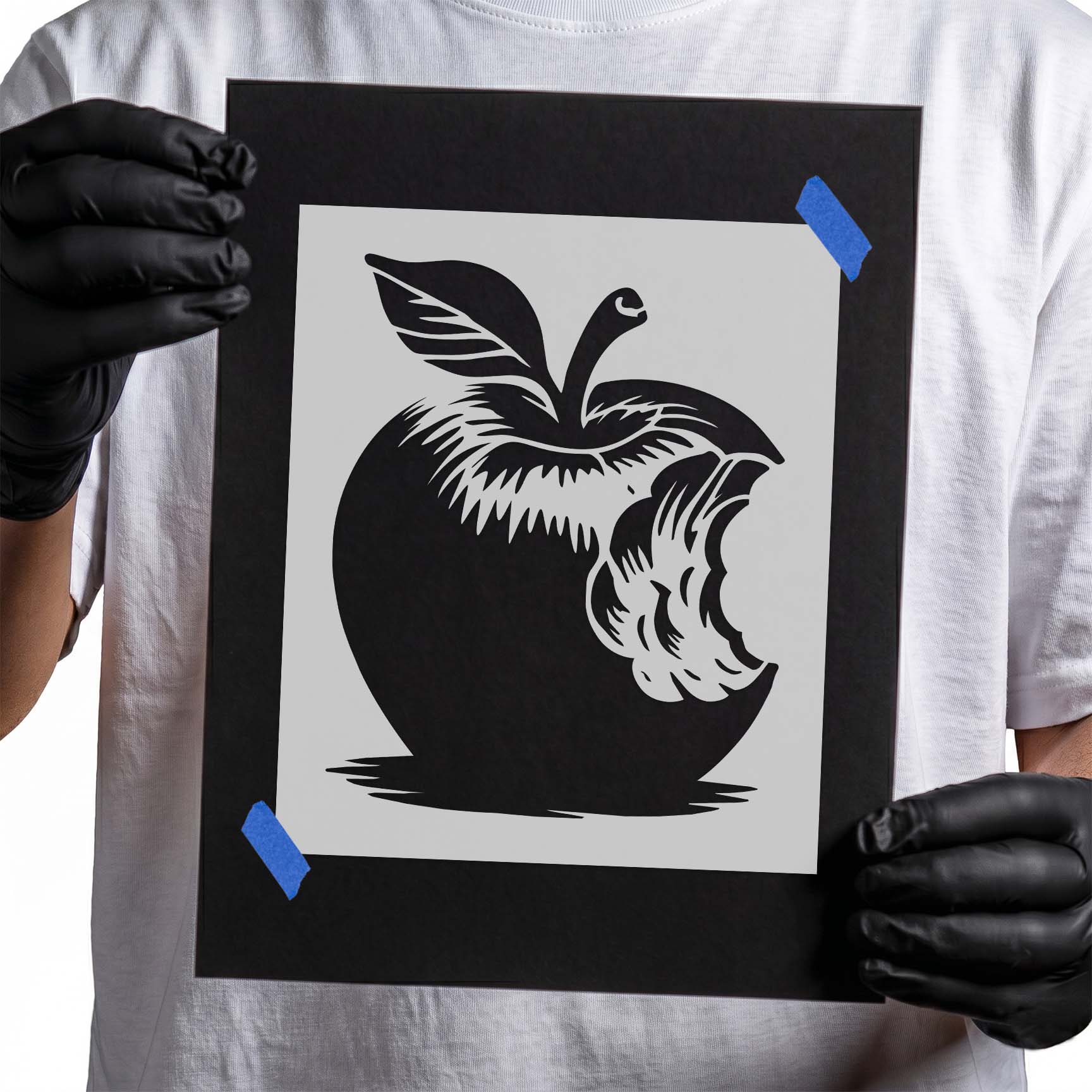 Bitten apple silhouette stencil with detailed leaf and stem