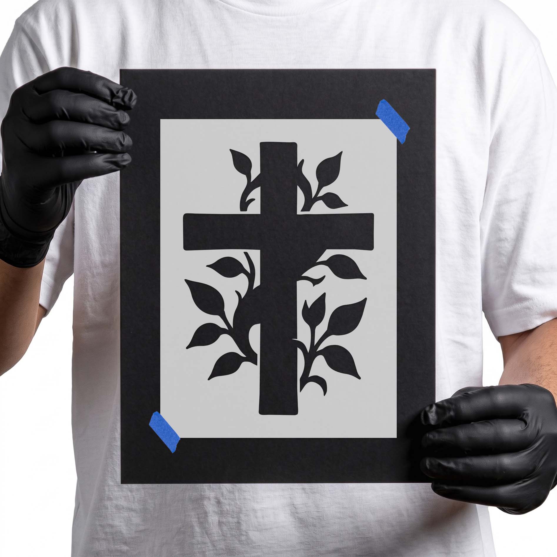 Bold cross entwined with leafy botanical vines and branches