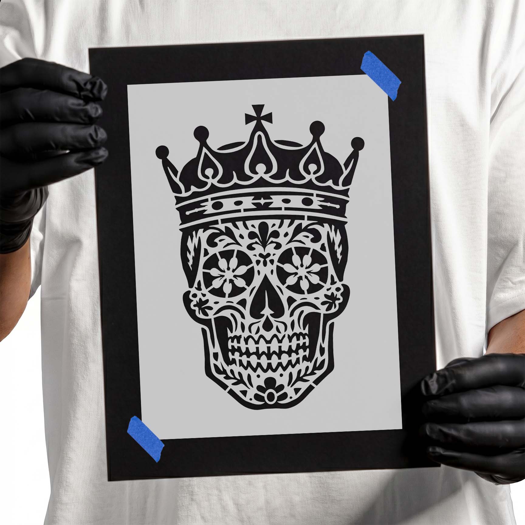 Sugar skull stencil wearing an ornate royal crown with decorative details