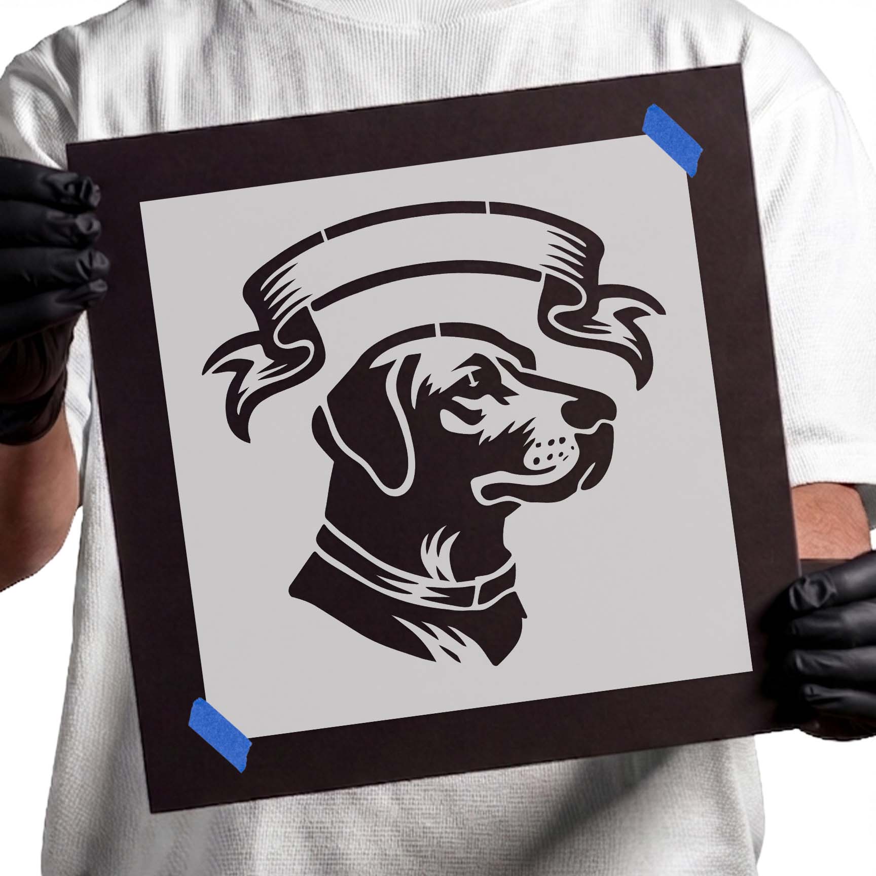 Dog profile stencil beneath a blank ribbon banner