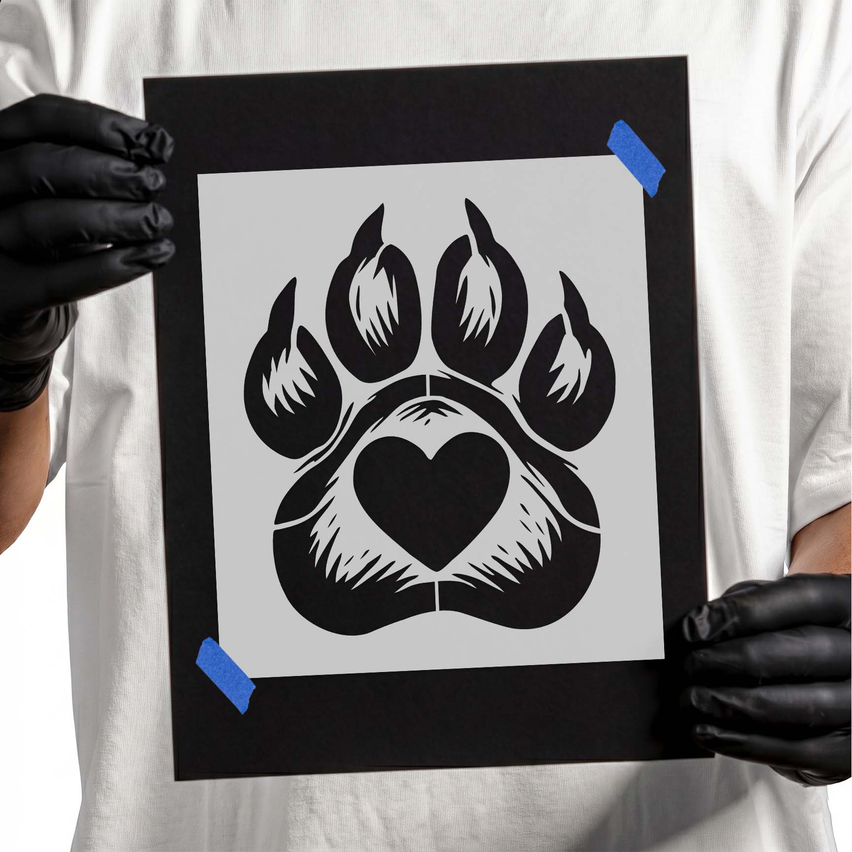 Dog paw print stencil featuring a heart-shaped center with detailed fur accents