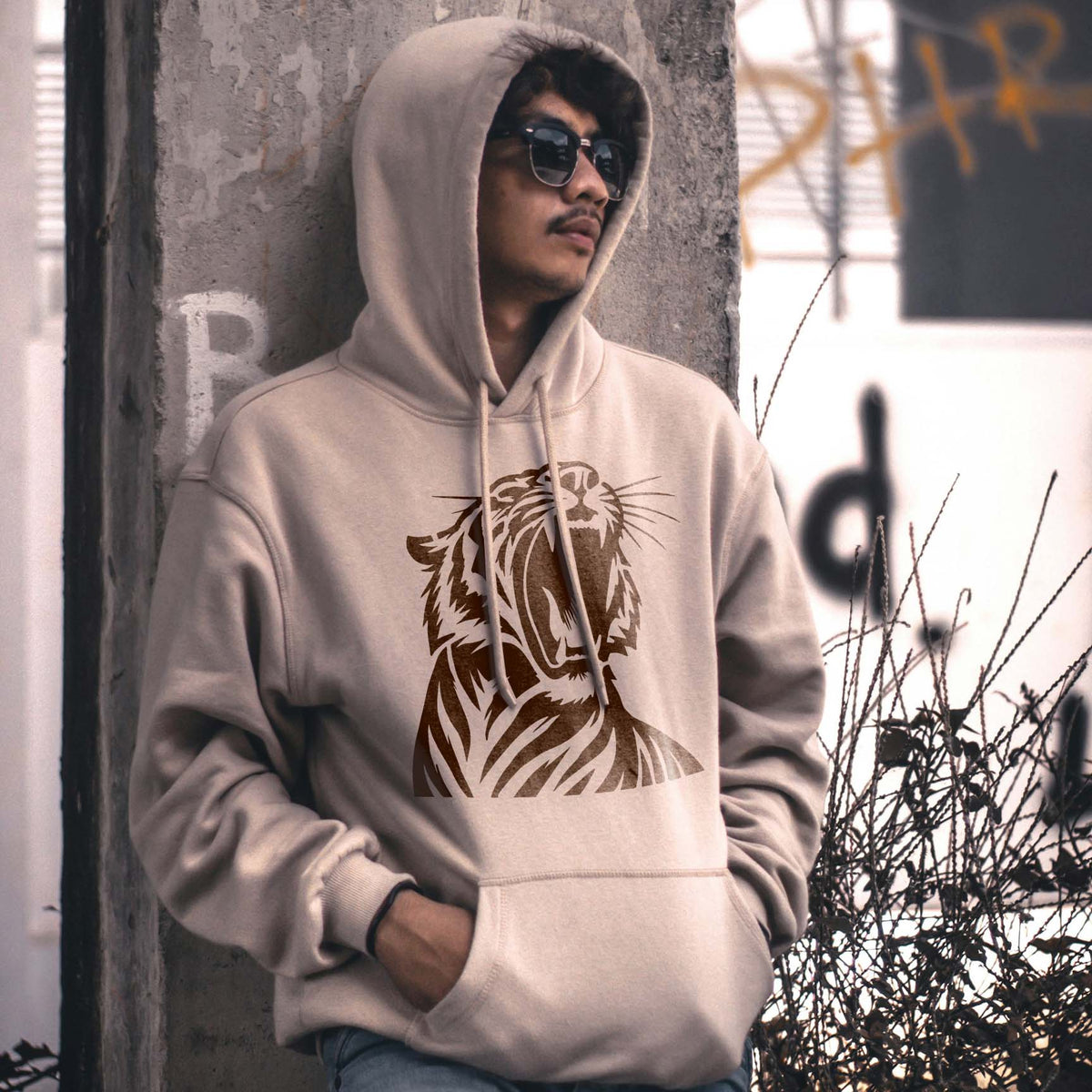 Fierce Roaring Tiger stencil printed on the front of a beige hoodie