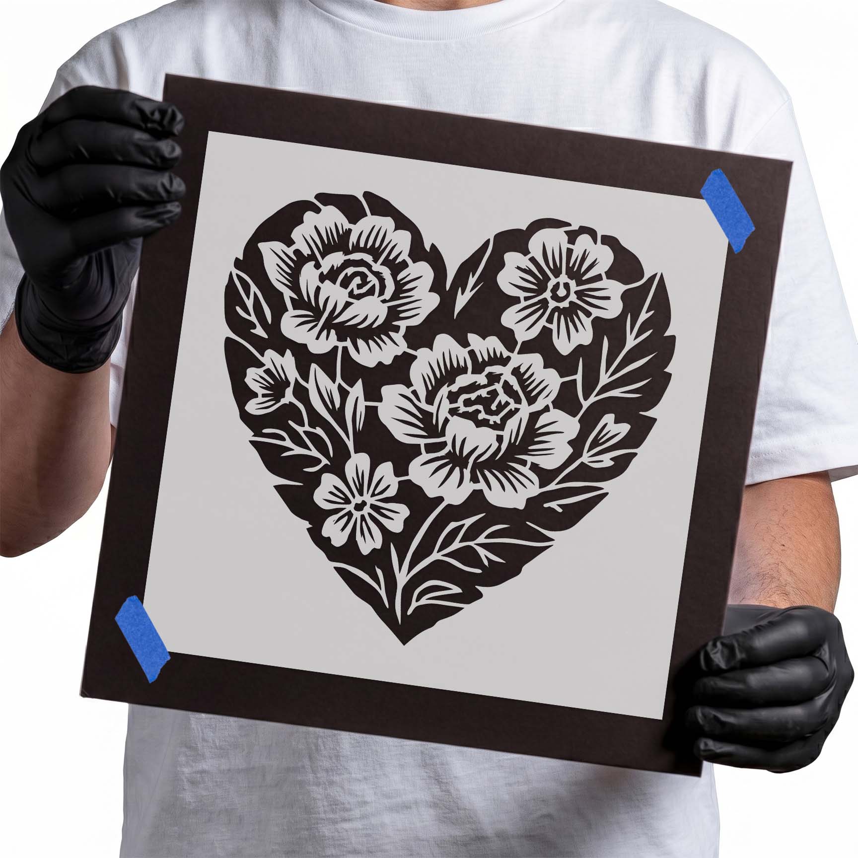 Floral heart stencil filled with layered flowers leaves and stems