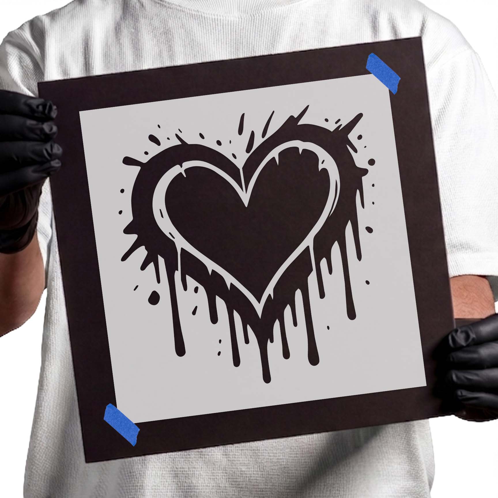 Graffiti heart stencil with dripping paint and splatter accents