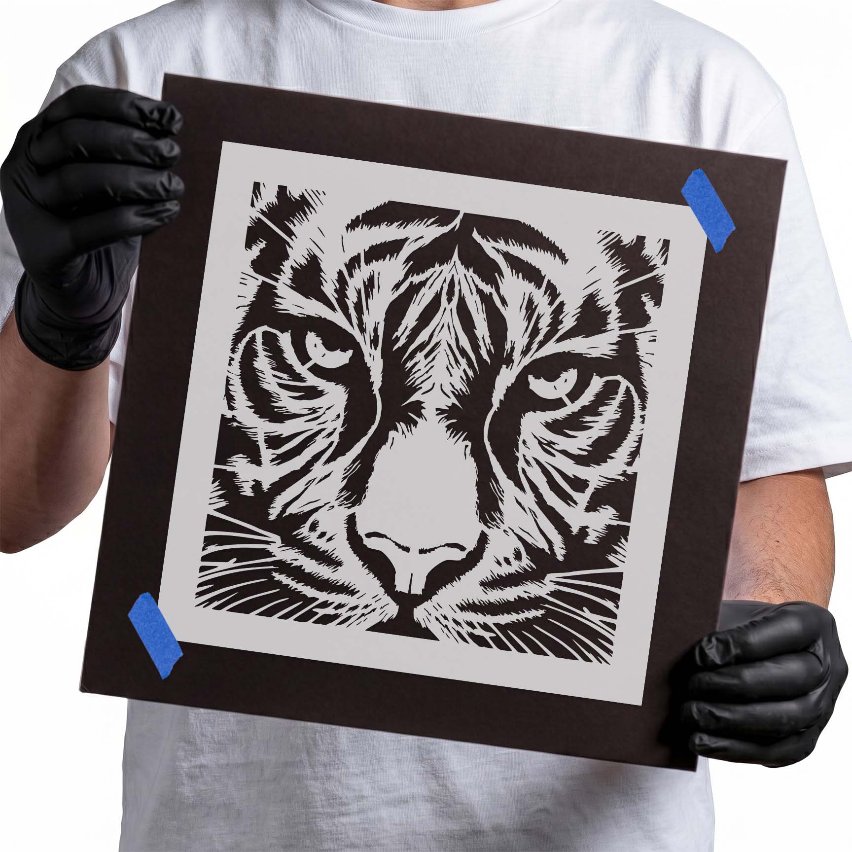 Close-up tiger face stencil with bold eyes and striped markings