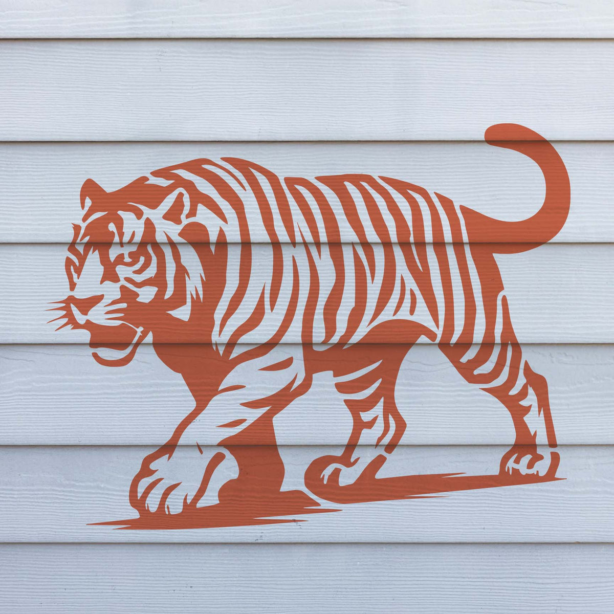 Powerful Majestic Walking Tiger Stencil strides across crisp white wall siding