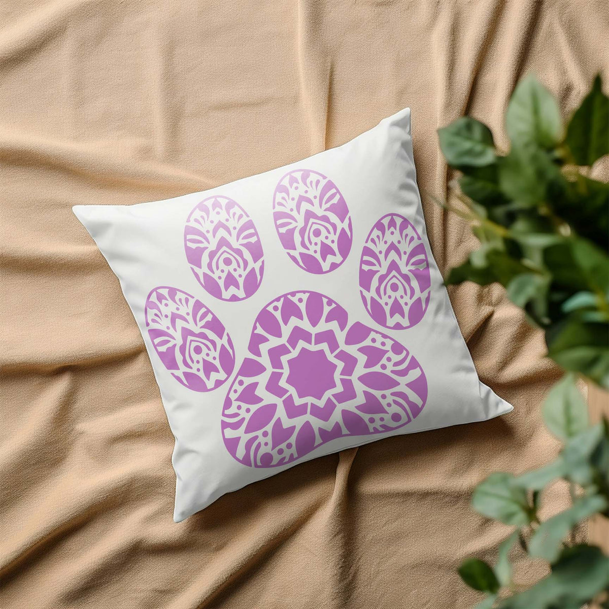 Soft purple Mandala Paw Print Stencil adds an ornate paw motif to a crisp white pillow