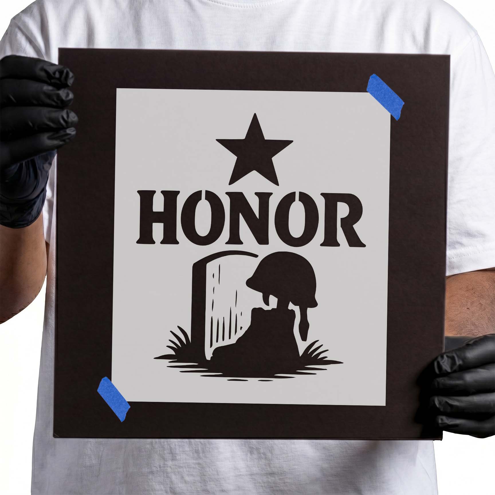 Battlefield cross memorial with HONOR text and military tribute star.