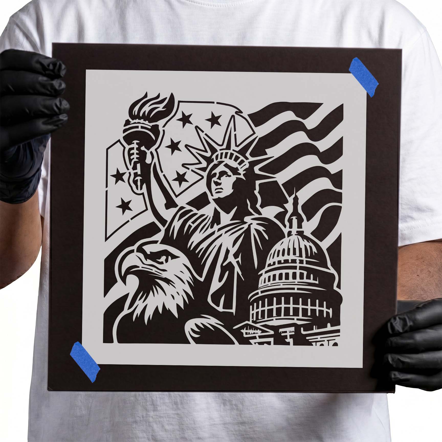 Patriotic stencil featuring American landmarks, eagle, and waving flag