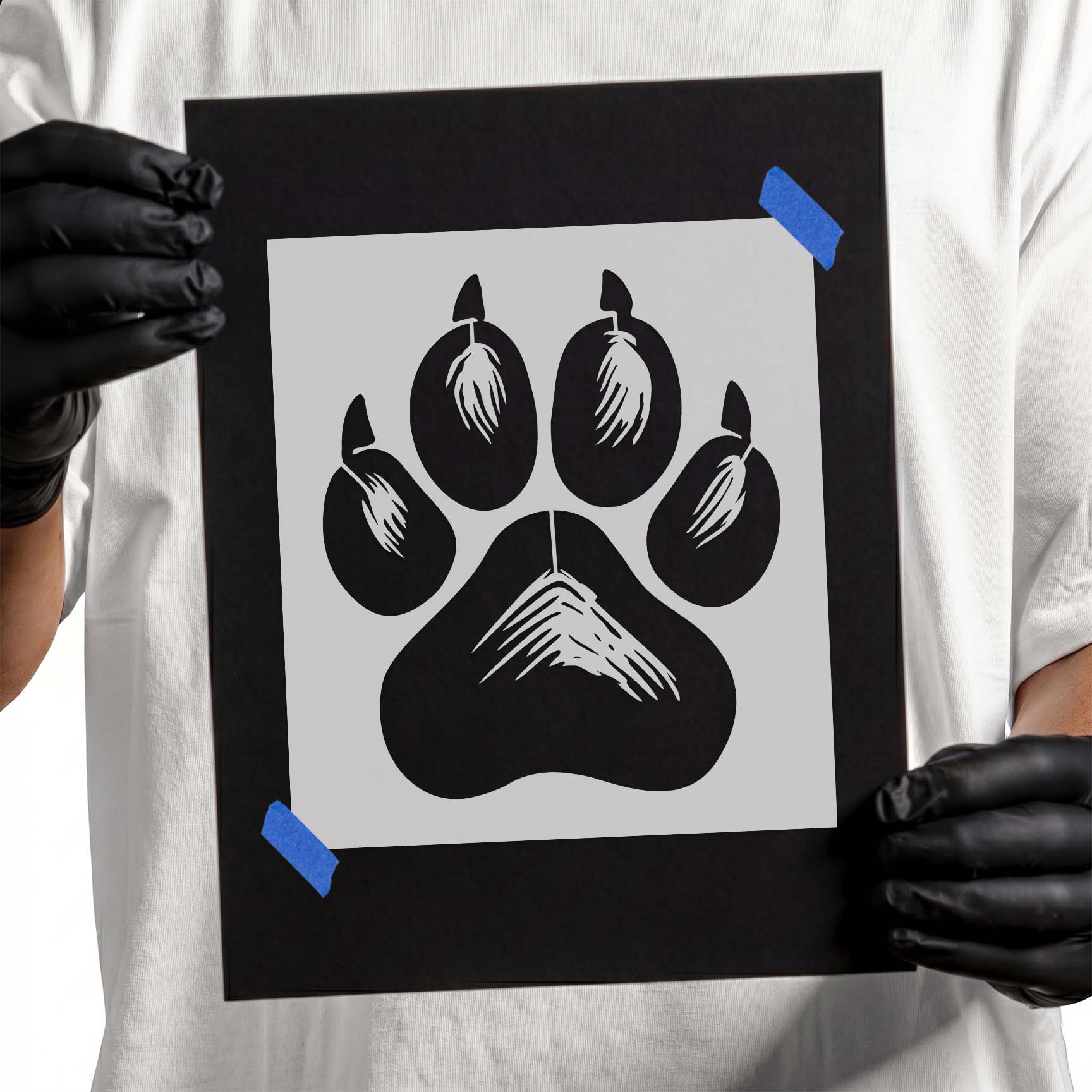 Realistic dog paw print stencil with textured pads and claw details