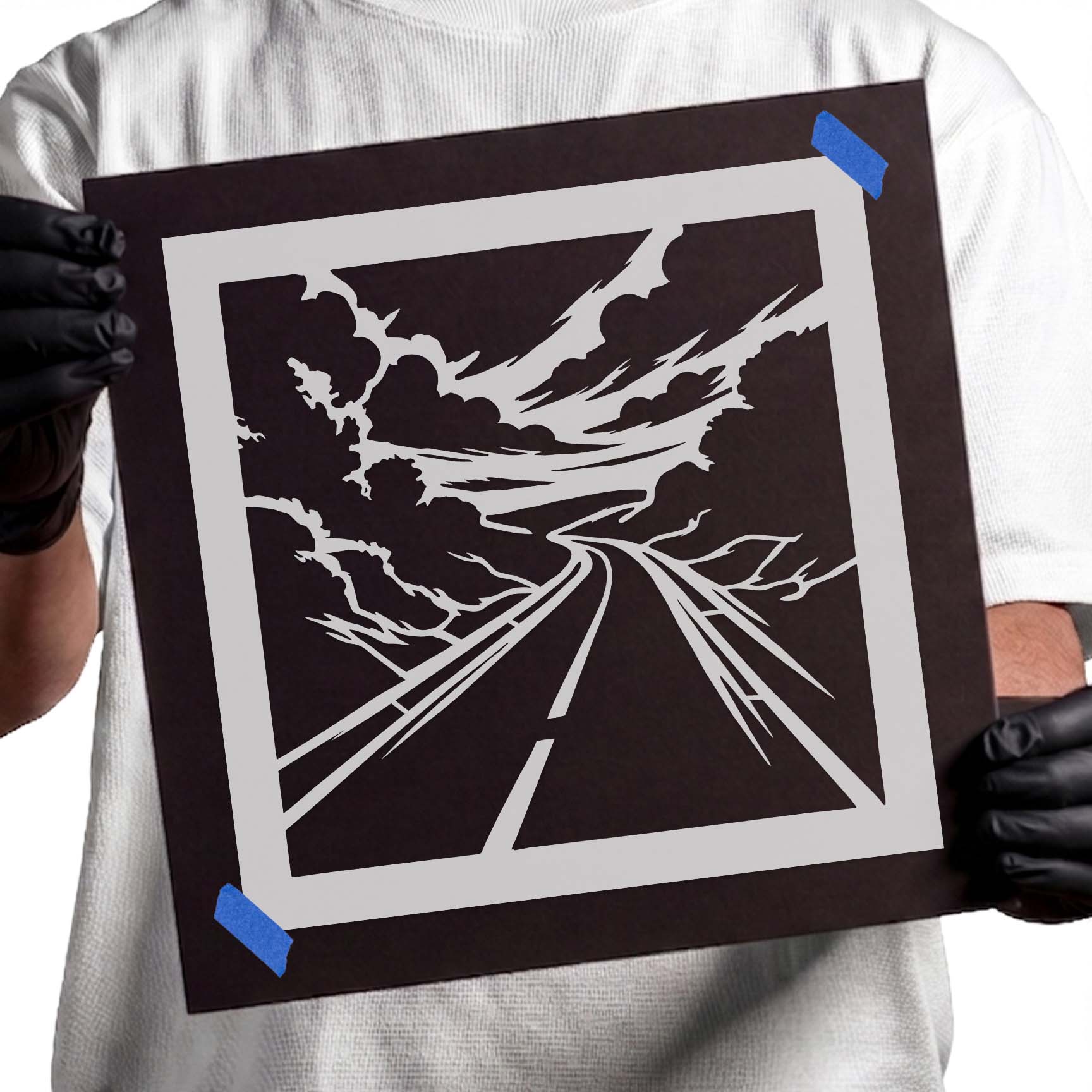 Winding highway stretching beneath dramatic clouds stencil design