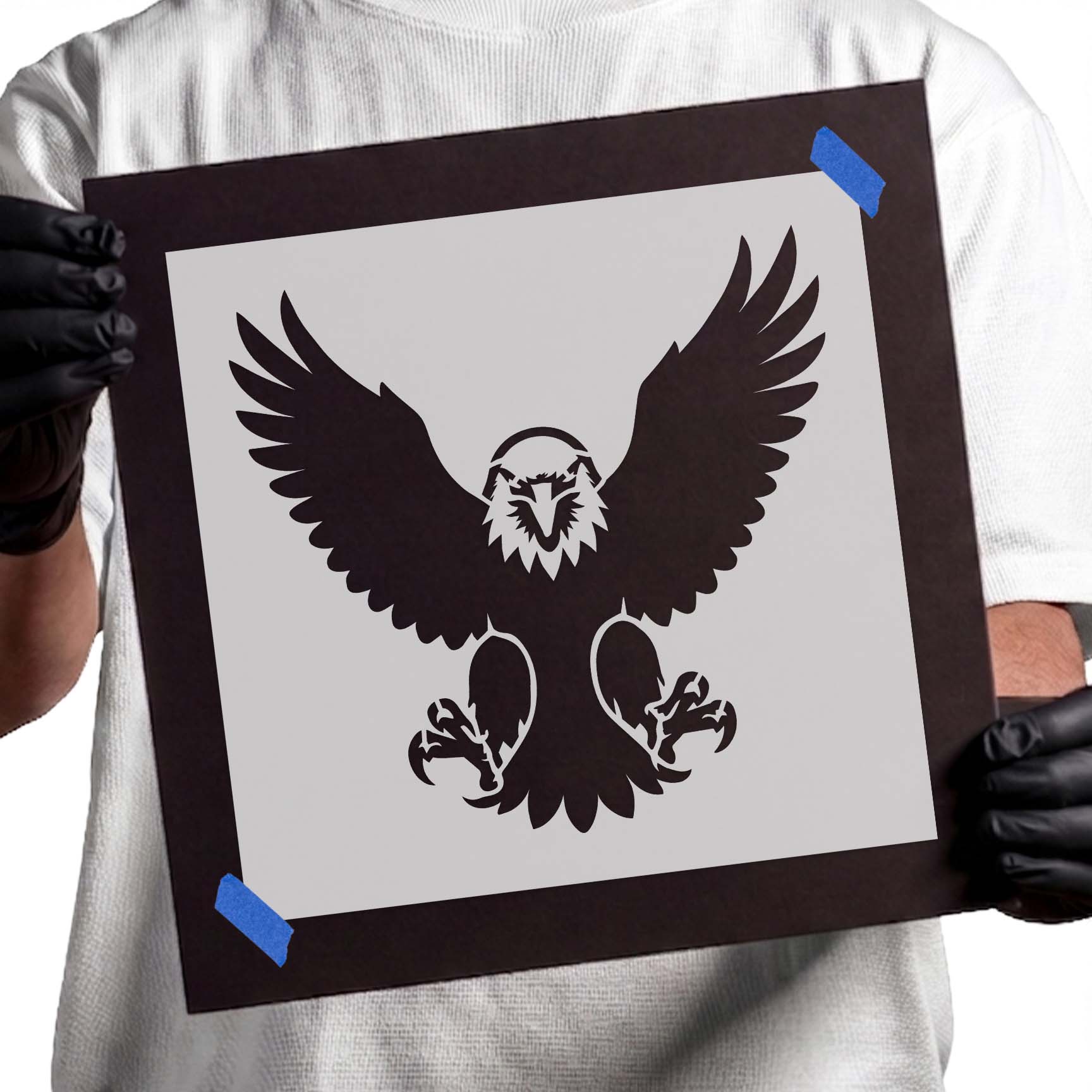 Front-facing eagle stencil with fully spread wings, sharp talons, and bold symmetrical silhouette