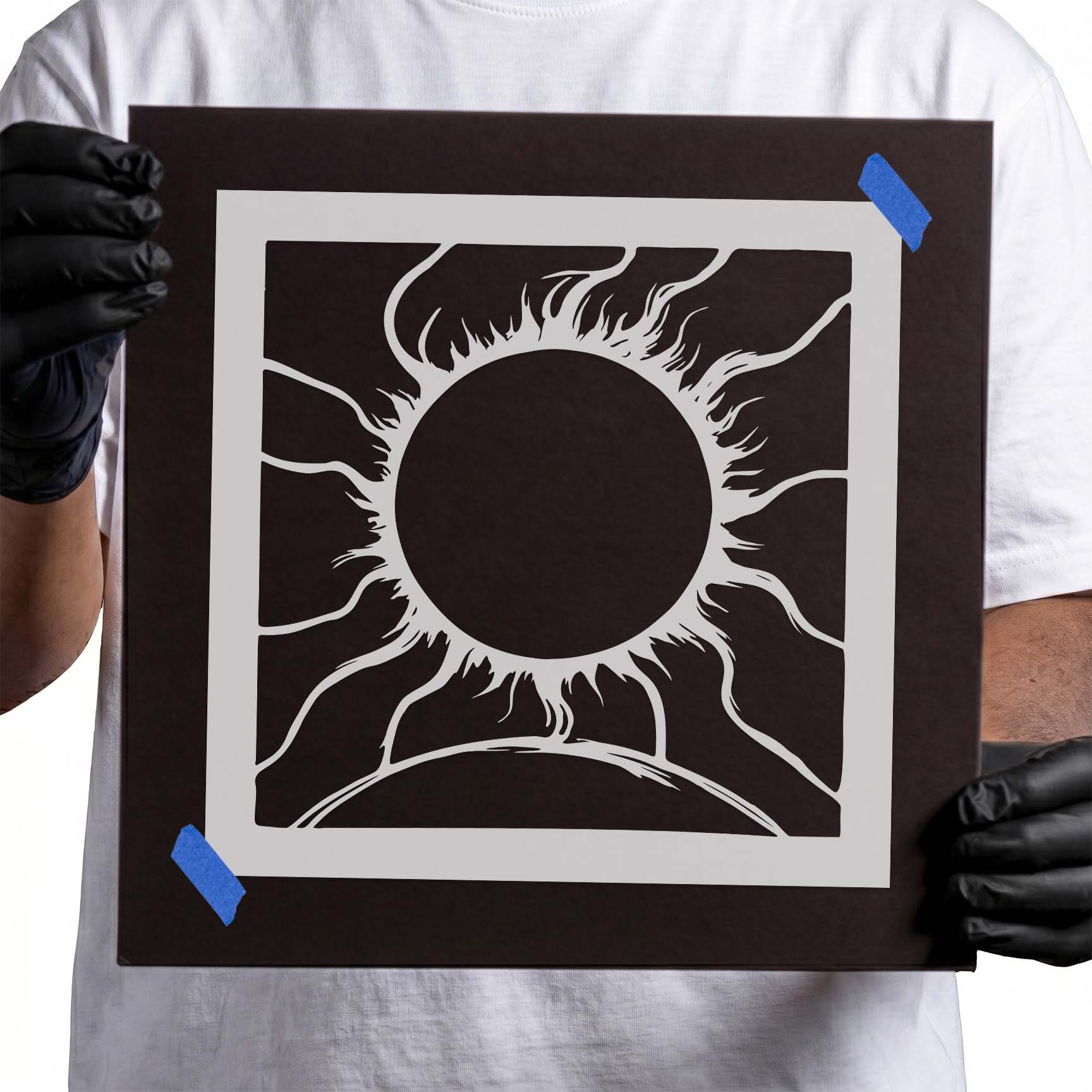 Solar eclipse above a curved horizon with radiant rays stencil