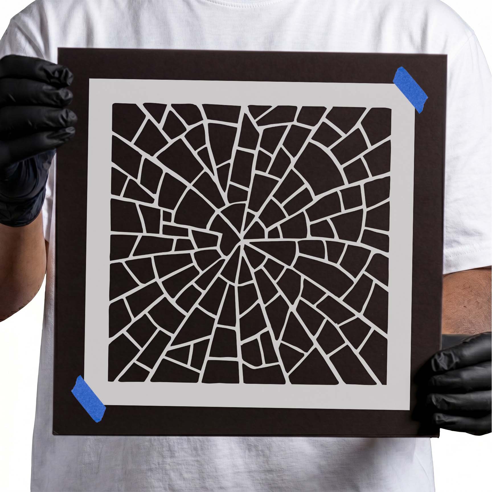 Spiral mosaic pattern with irregular stone tile shapes