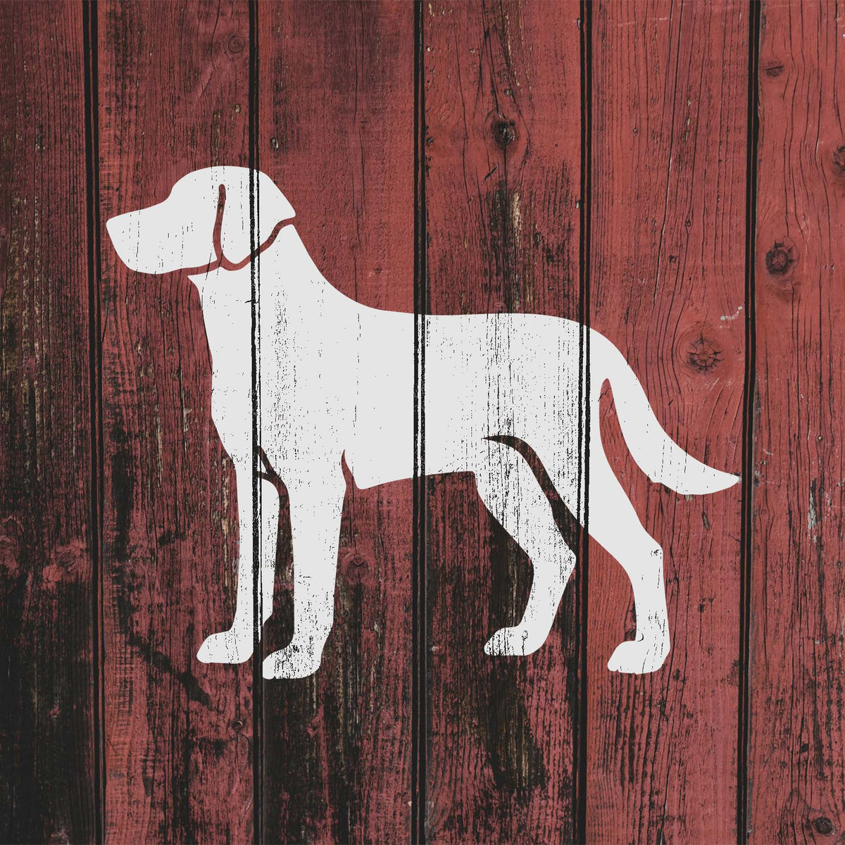 Standing Labrador Retriever Stencil displayed in white across weathered red wooden fence boards.