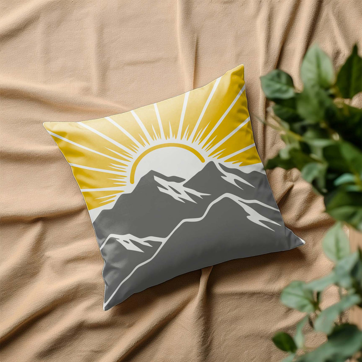 Golden rays crown gray peaks on a pillow featuring the Sunrise Mountain Landscape Stencil