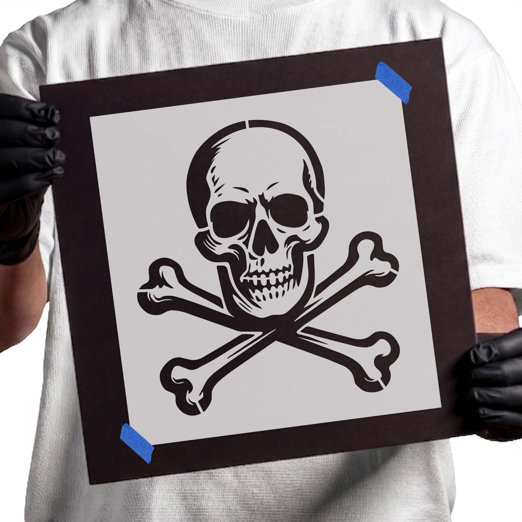 Detailed human skull above crossed bones in classic pirate emblem design