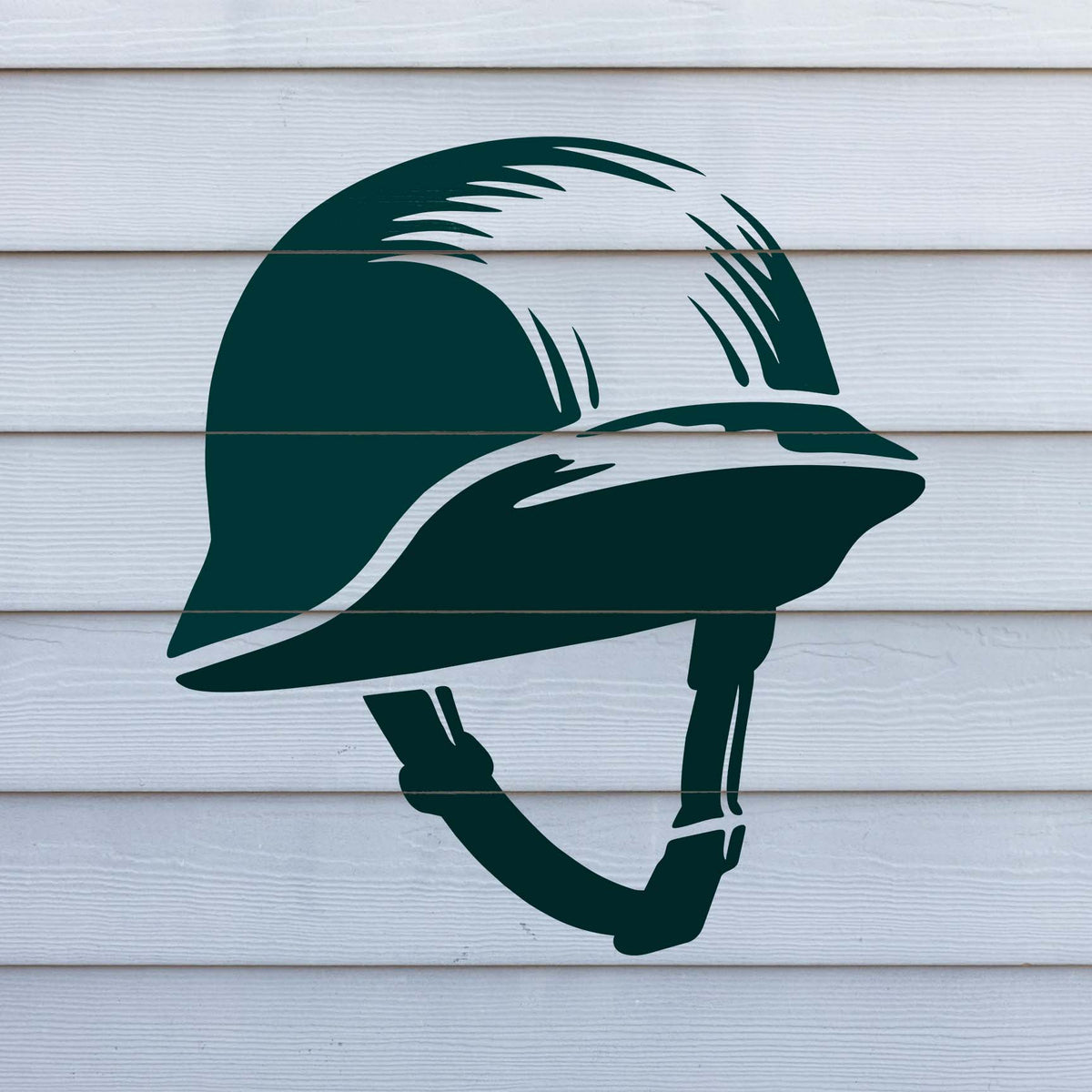 WWII Style Helmet Stencil painted across white horizontal wall siding