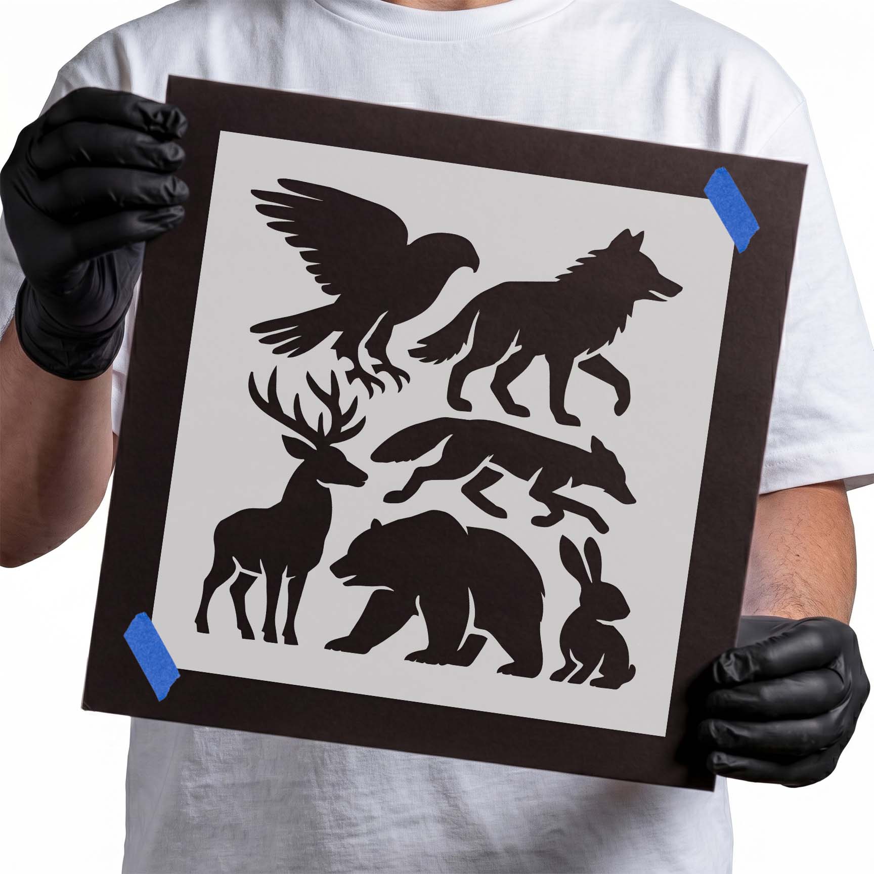 Woodland animal silhouettes stencil with eagle, wolf, deer, fox, bear, and rabbit
