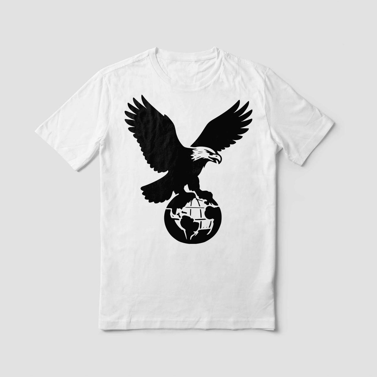 A white T-shirt features the American Eagle Perched on Globe Stencil with bold black wings and a detailed globe.