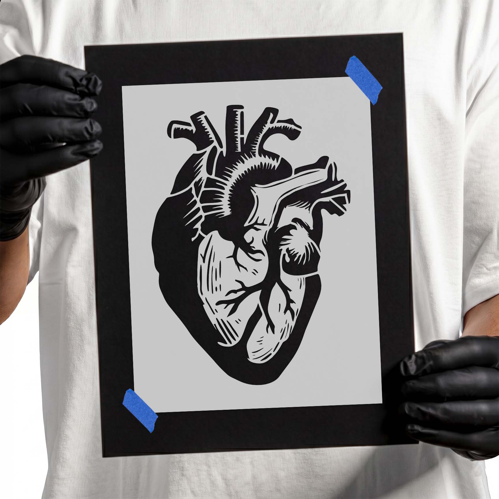 Detailed human heart stencil with visible chambers and vessels