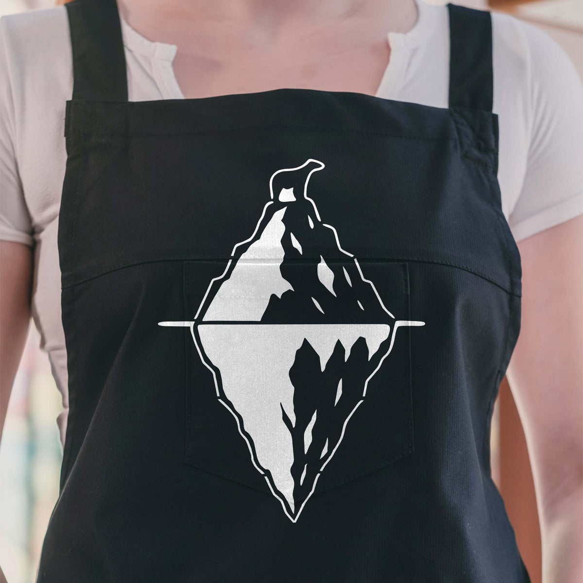 Arctic iceberg polar bear illusion stencil painted in white on a black apron