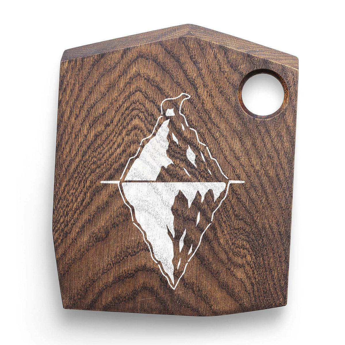 Clever polar bear iceberg illusion stencil painted on a dark wood cutting board
