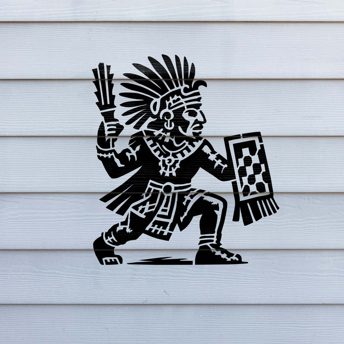 Aztec Warrior Shield Stencil painted black on white horizontal wall siding.