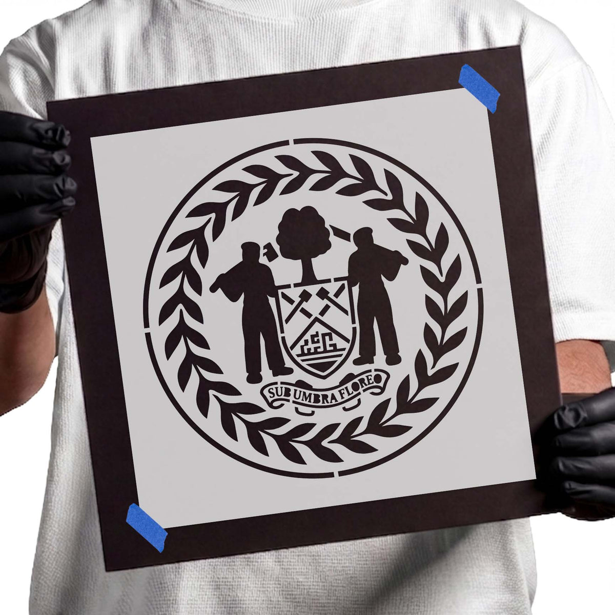 Belize flag stencil with coat of arms, figures, tree, and leafy border