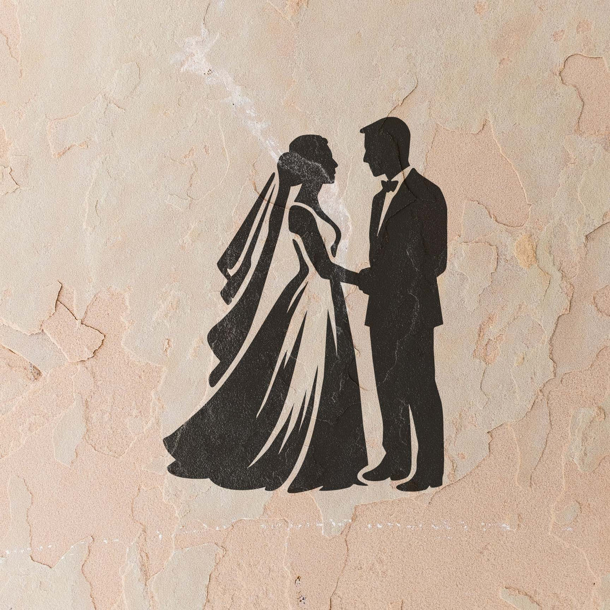 Bride and groom silhouette stencil painted black on a textured stucco wall