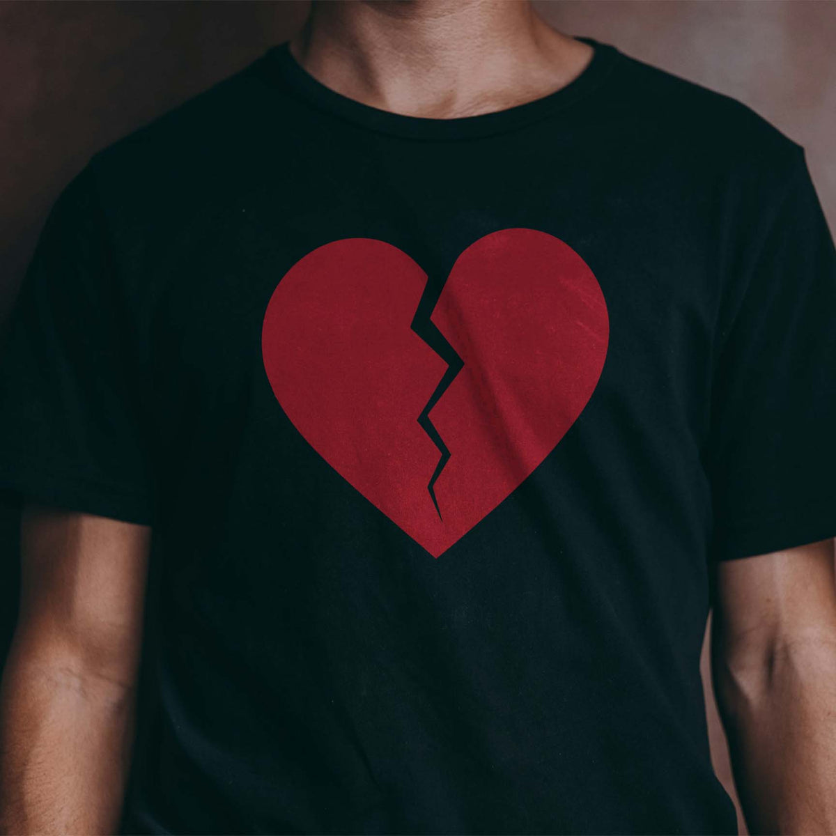Red Broken Heart Crack Stencil makes a bold heartbreak graphic across a black shirt