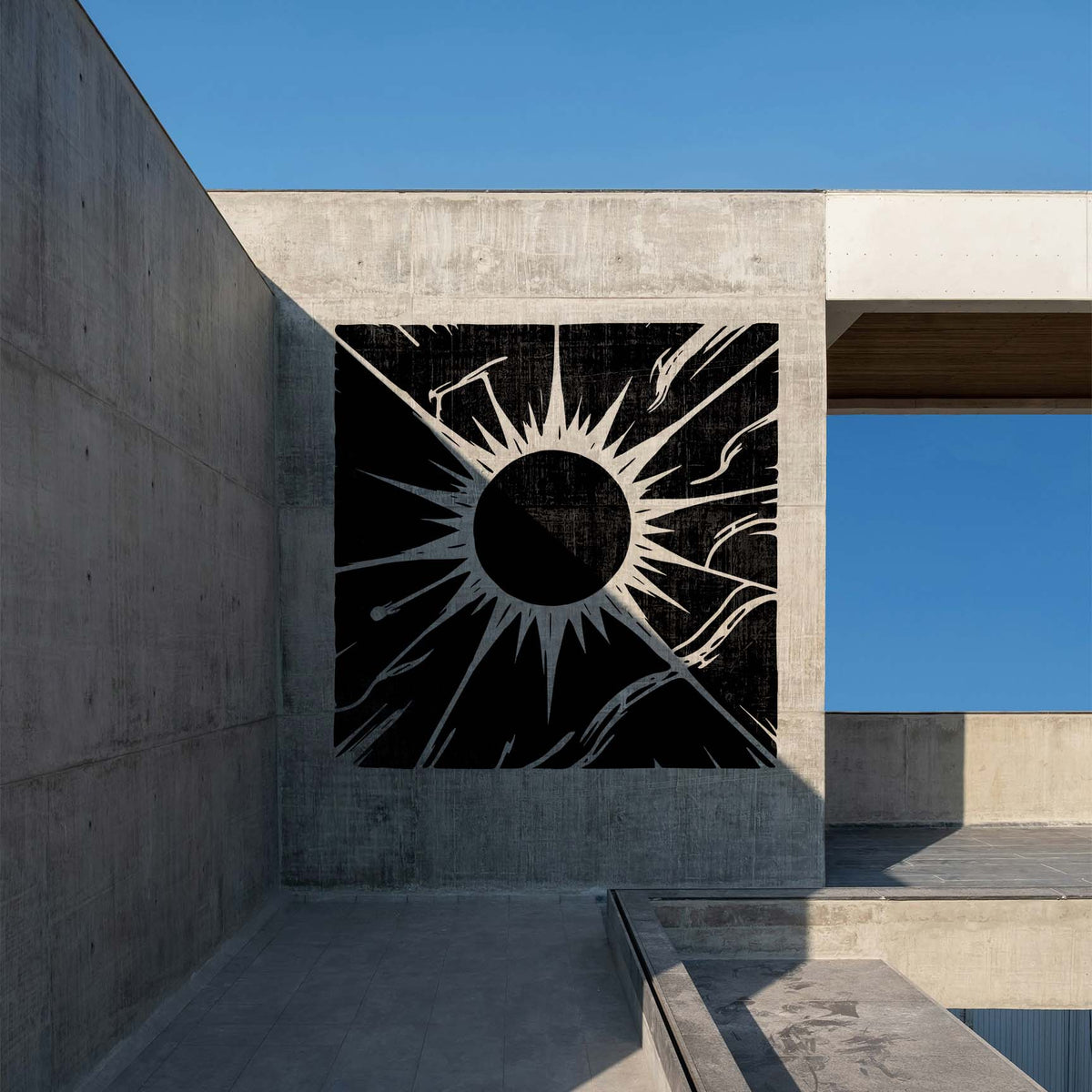 Celestial Corona Stencil adds a dramatic black solar burst to a modern concrete wall.