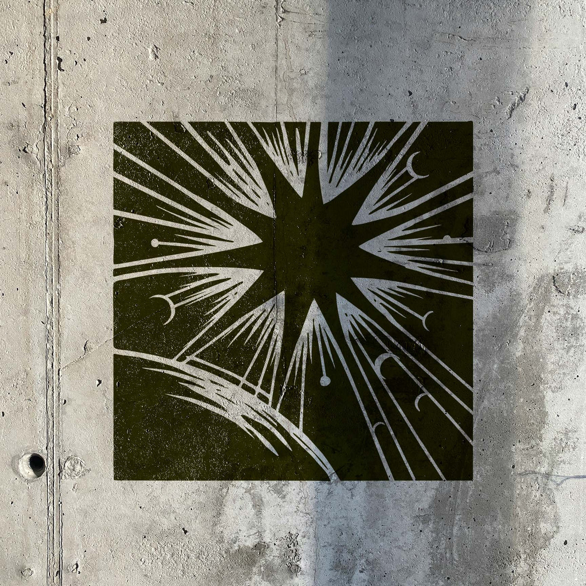 Celestial Sunburst Horizon Stencil with radiating rays and crescent moons on concrete