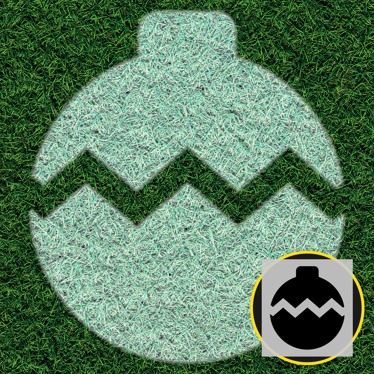 Christmas ornament lawn stencil painted white on green grass