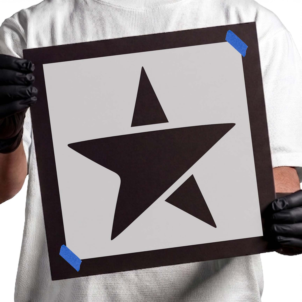 Dancing star stencil with fragmented points and detached geometric accents