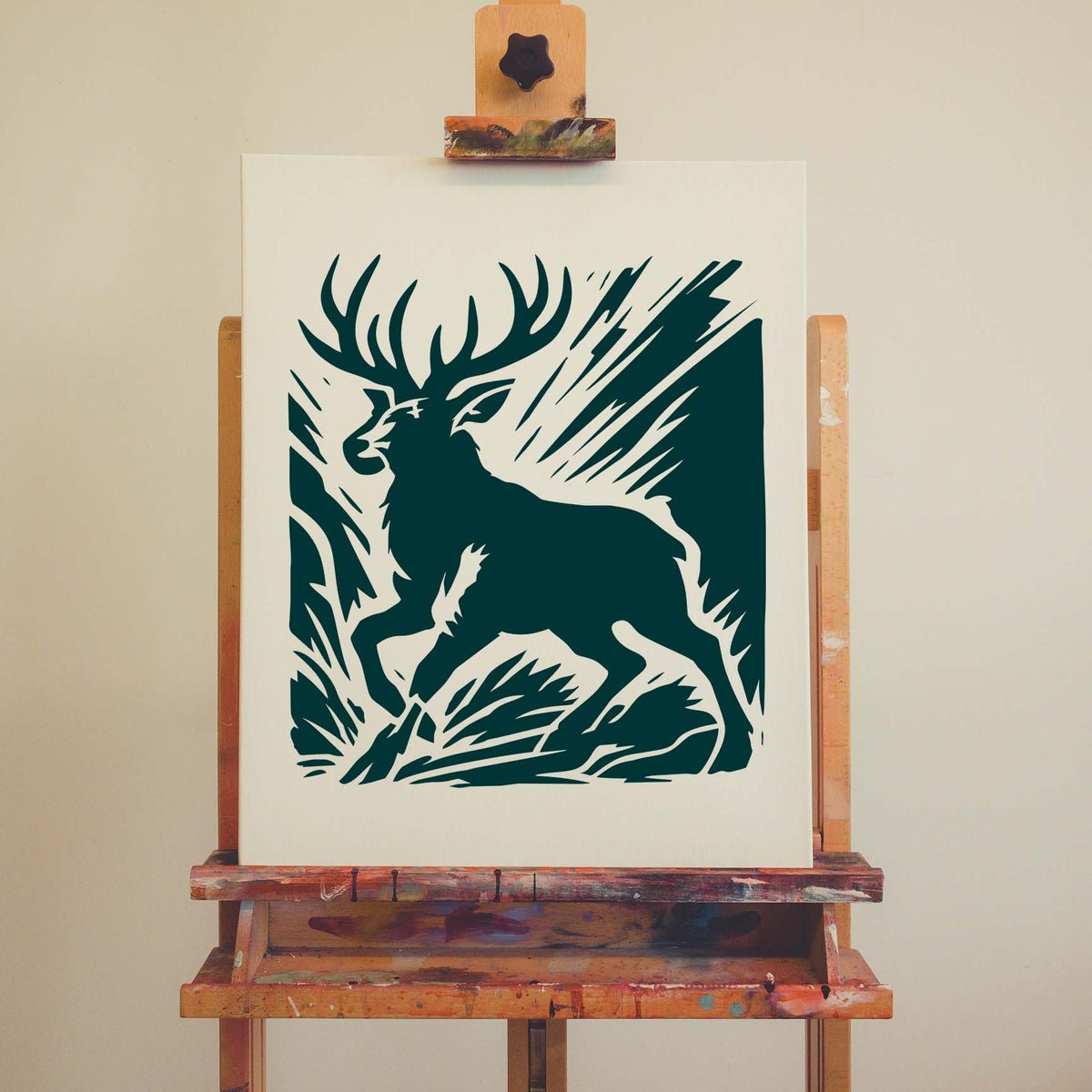 Deer With Antlers Stencil displayed in dark green on artist canvas