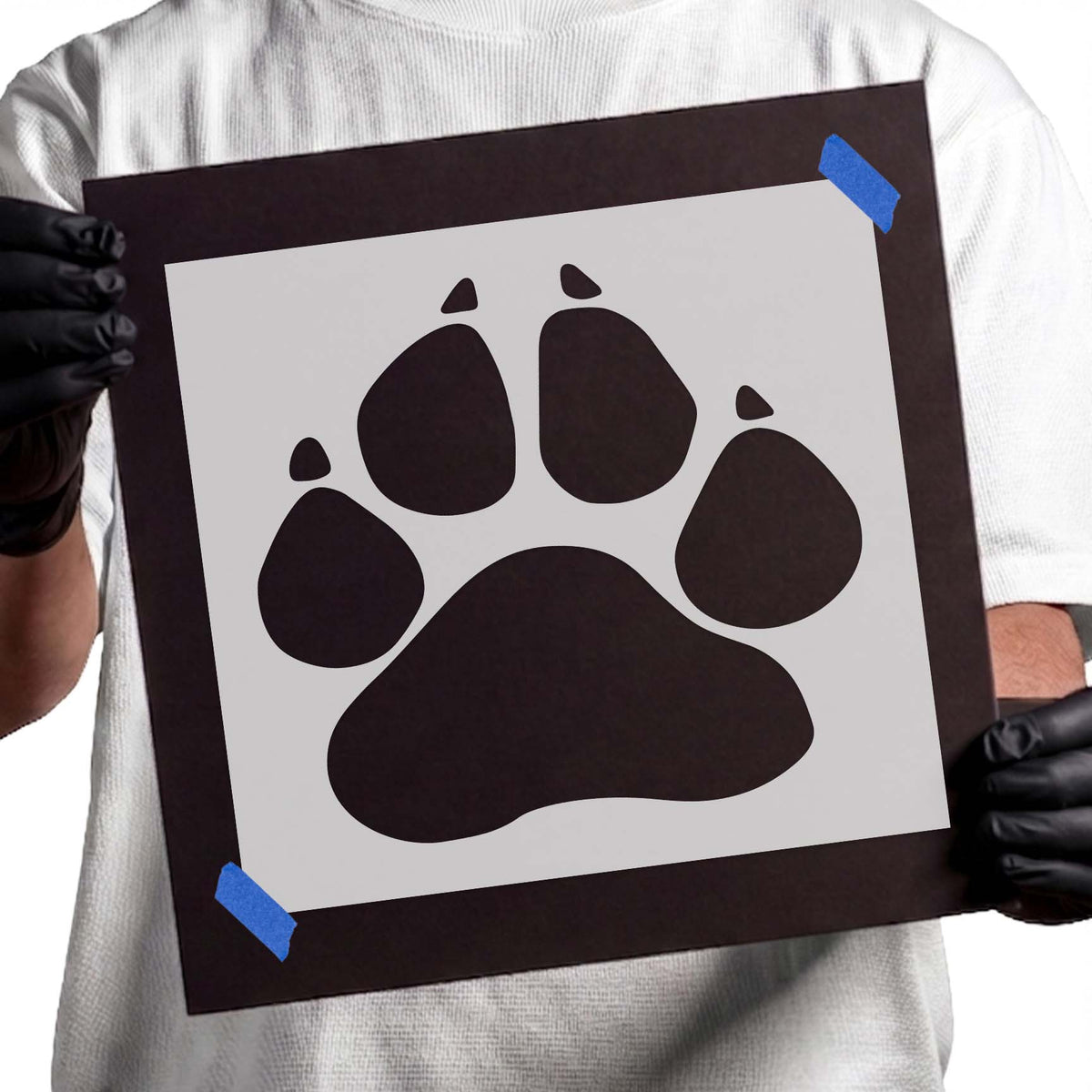 Dog Paw Stencil featuring a bold paw print with four toe pads and large center pad