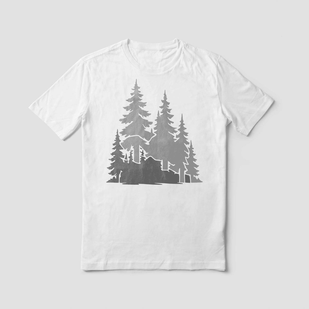 Evergreen Woodland Trees stencil brings a towering pine forest silhouette to a white shirt