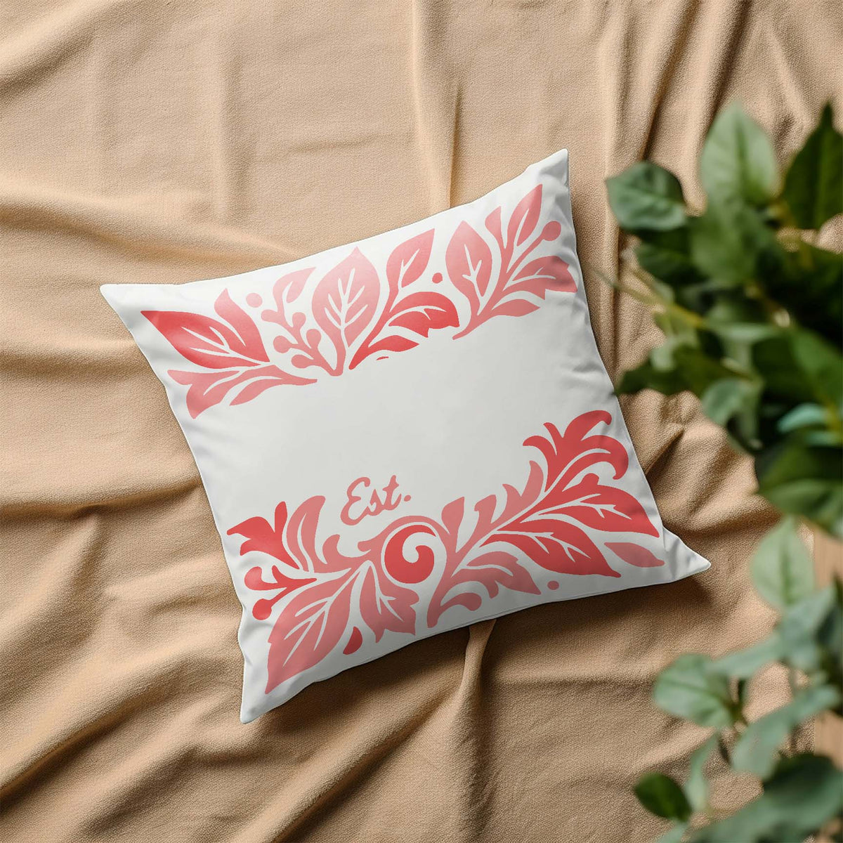 Family Name & Established Date stencil with floral border decorating a white pillow