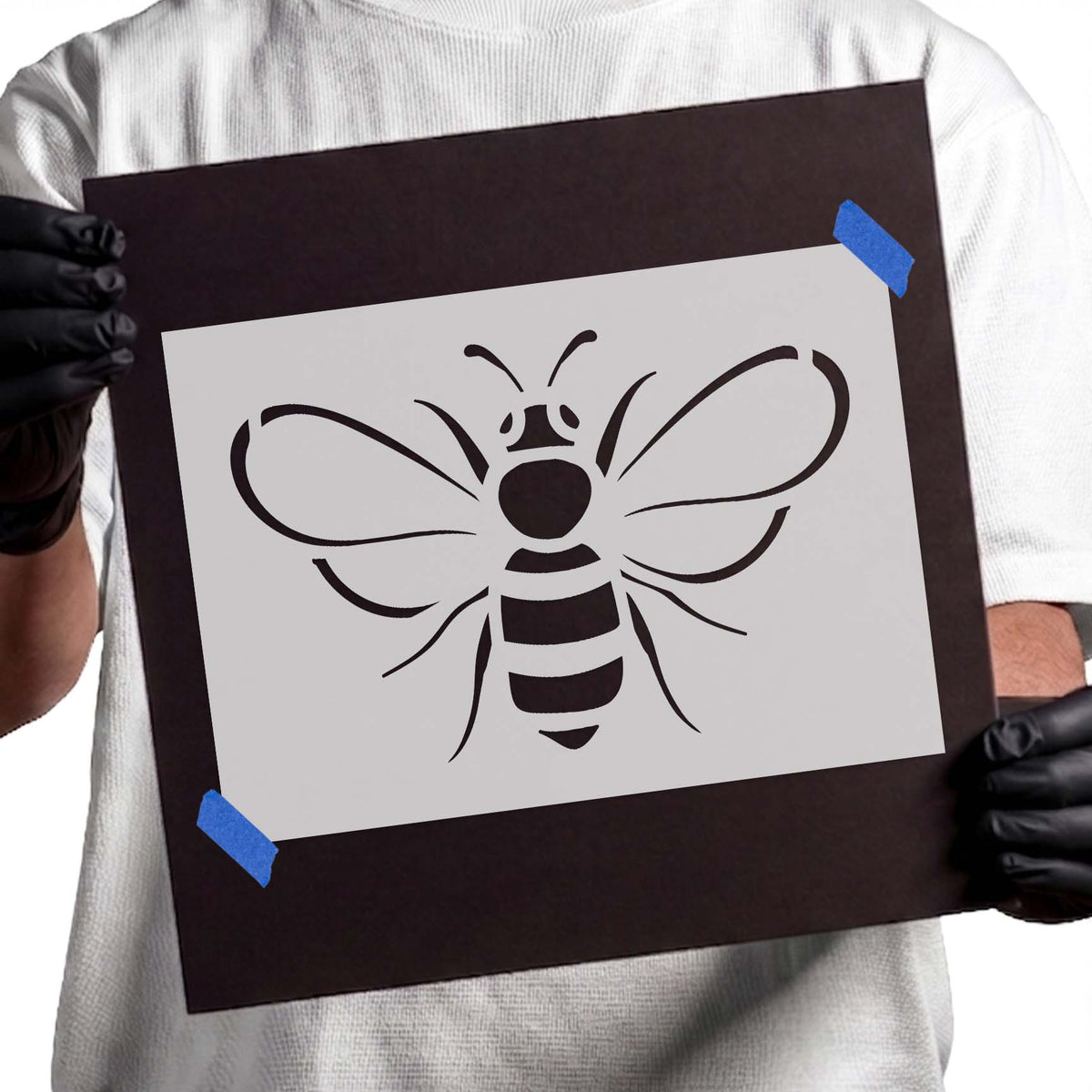 Flying bee stencil with striped body and wide curved wings