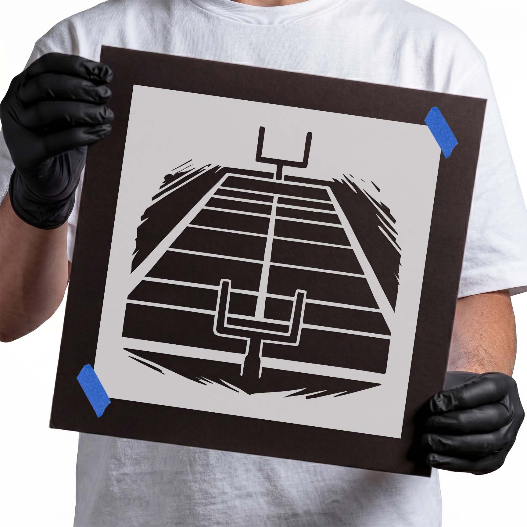 Football field stencil with yard lines and goalposts at both ends