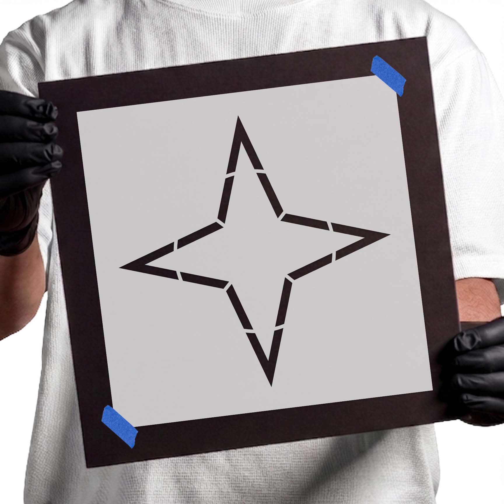 Four-point star outline stencil with bold geometric lines and clean symmetrical design
