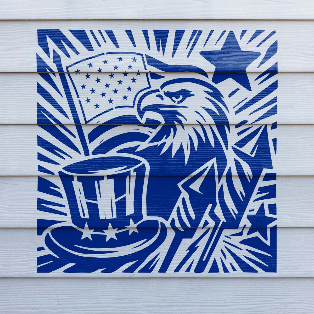 Blue Fourth of July Eagle & Flag Stencil brightens white siding with a bald eagle, stars, and Uncle Sam hat.