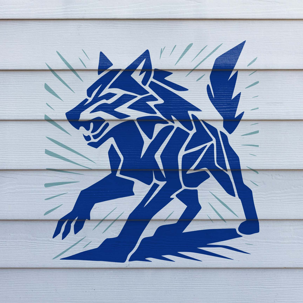 Geometric Wolf Stencil painted in blue across white horizontal wall siding