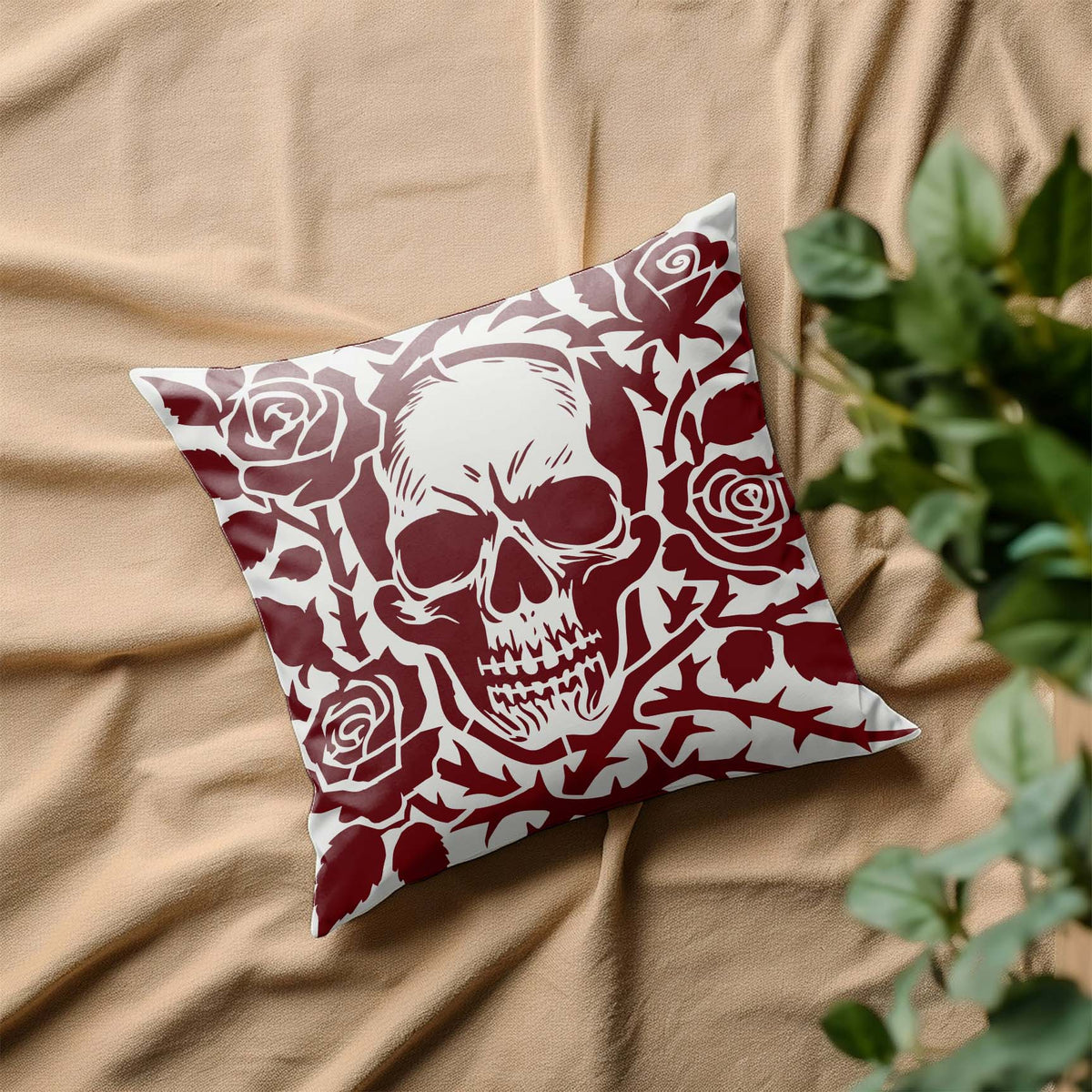 Gothic Skull and Thorned Roses Stencil gives a white pillow a dramatic burgundy floral design