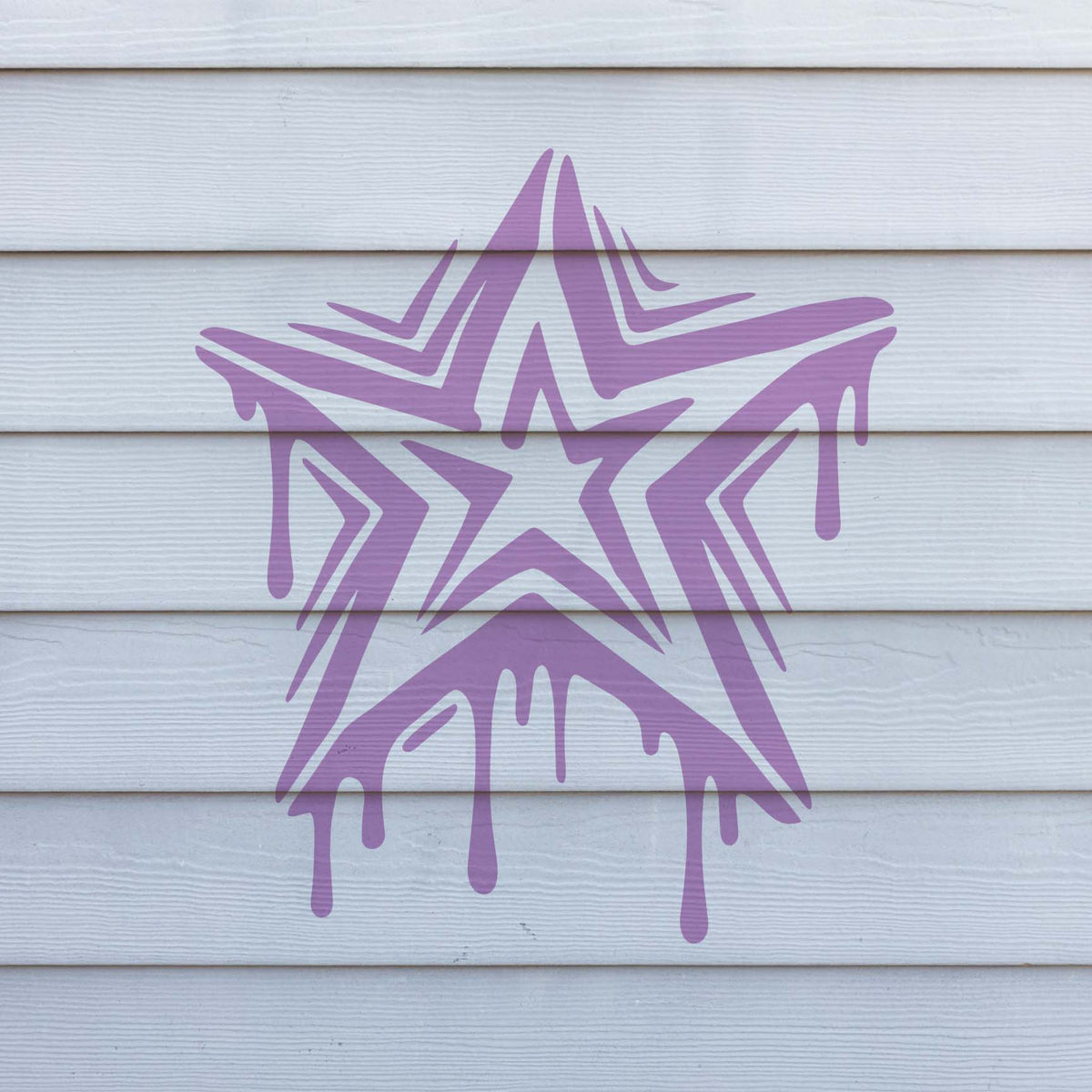 Graffiti Star With Drips Stencil stands out in purple across clean white exterior siding