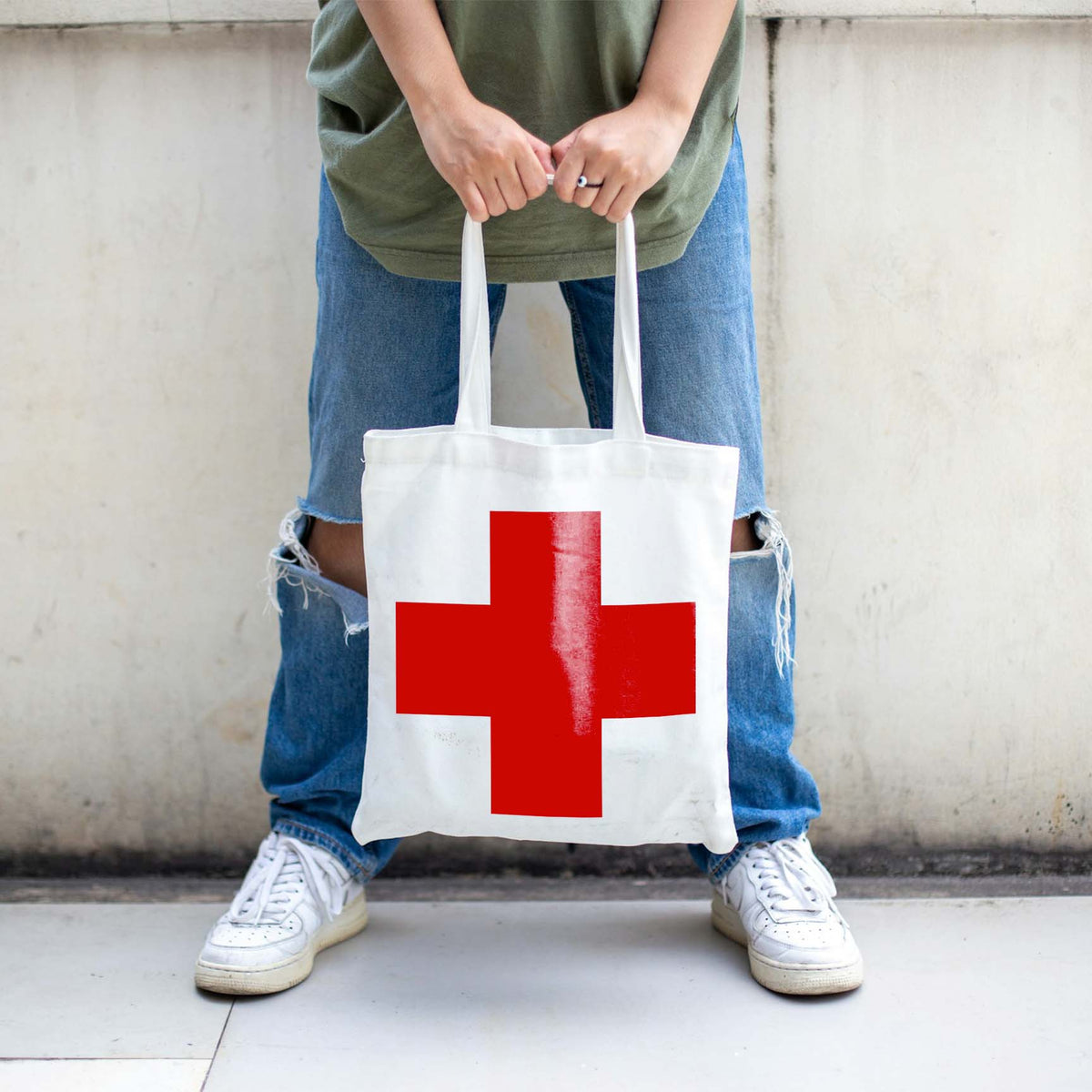 Greek Cross Stencil adds a vivid red cross design to a white canvas tote bag