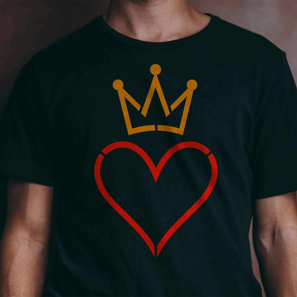 Crowned Heart Outline Stencil brings a red heart and golden crown design to a black T-shirt