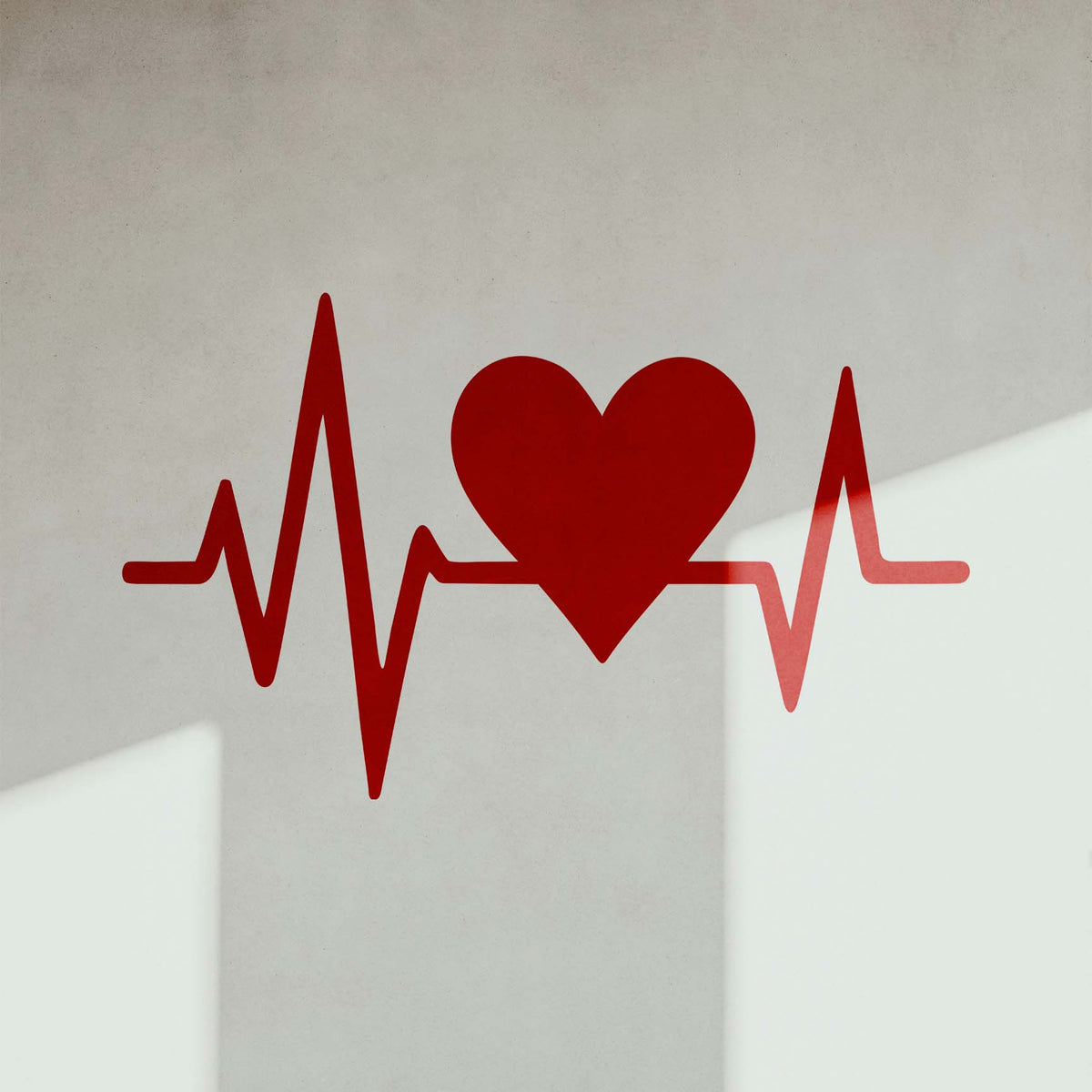 Bold red Heartbeat Heart Pulse Line Stencil stretches across a modern light gray wall