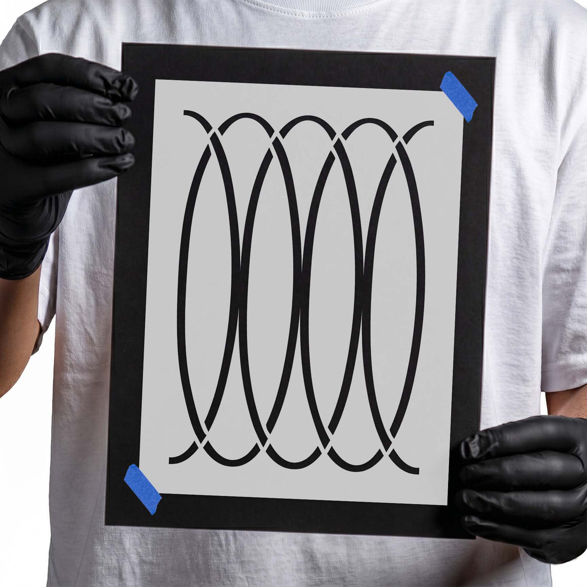 Interlocking Oval Pattern Stencil with tall overlapping loops and symmetrical curved lines